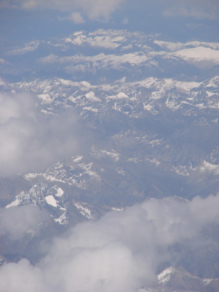 view from an airplane of the Himalayas