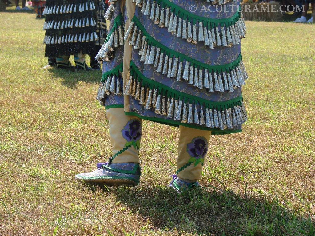 jingles are made out of rolled up snuff can lids sewed close together