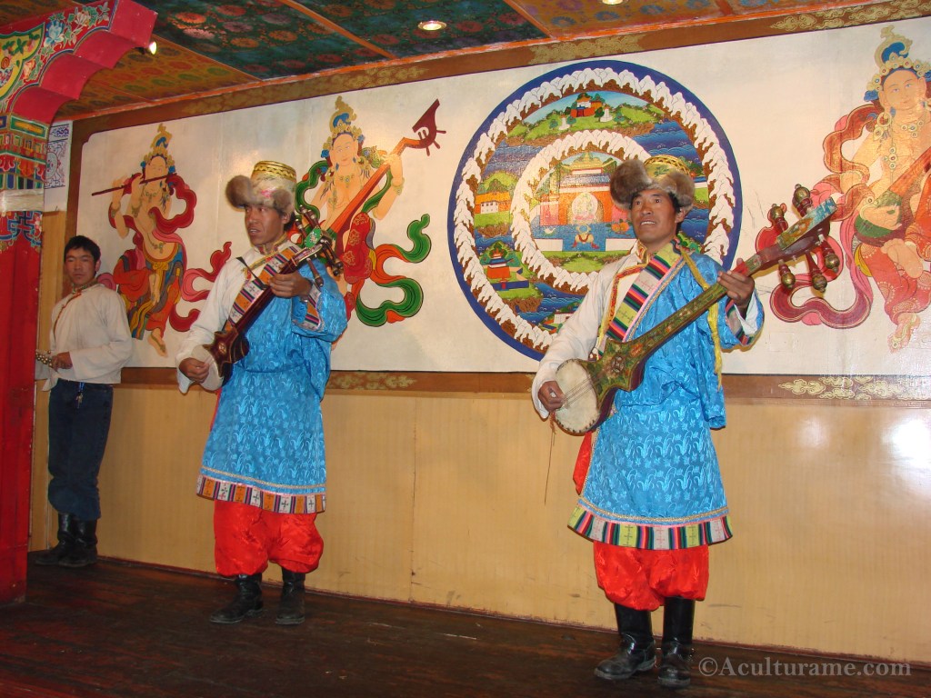 Tibetan Performers Playing a Dramyin 